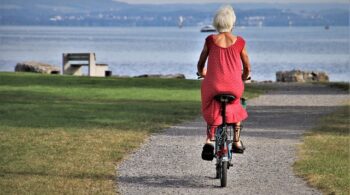 older woman riding bike